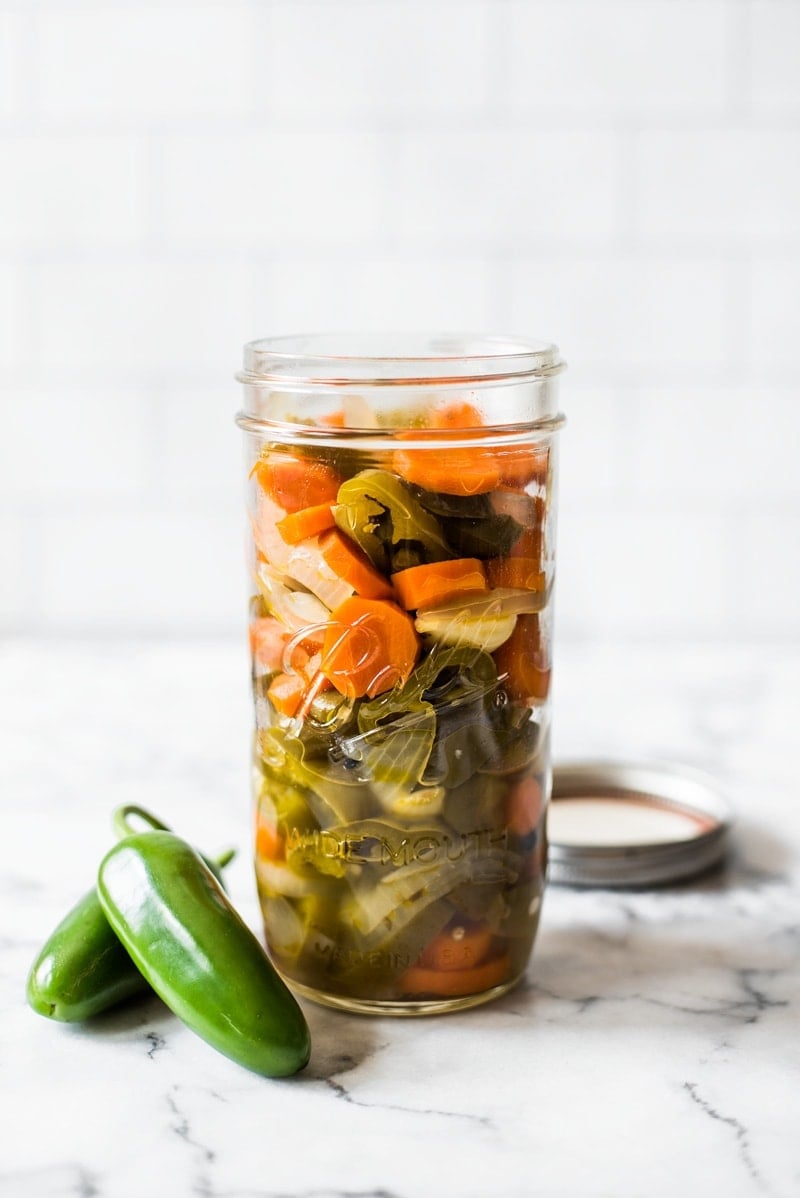 These Pickled Jalapenos are easy to make and are great for topping on all your favorite Mexican foods like nachos, tacos and enchiladas!