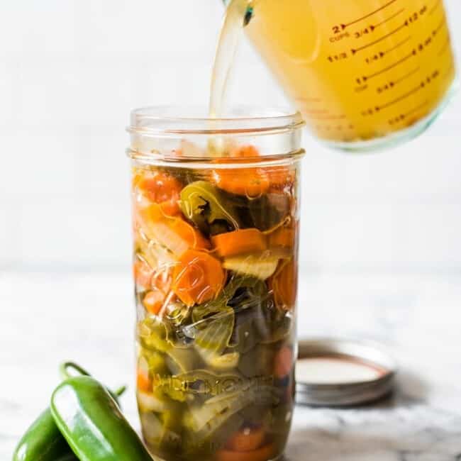 These Pickled Jalapenos are easy to make and are great for topping on all your favorite Mexican foods like nachos, tacos and enchiladas!