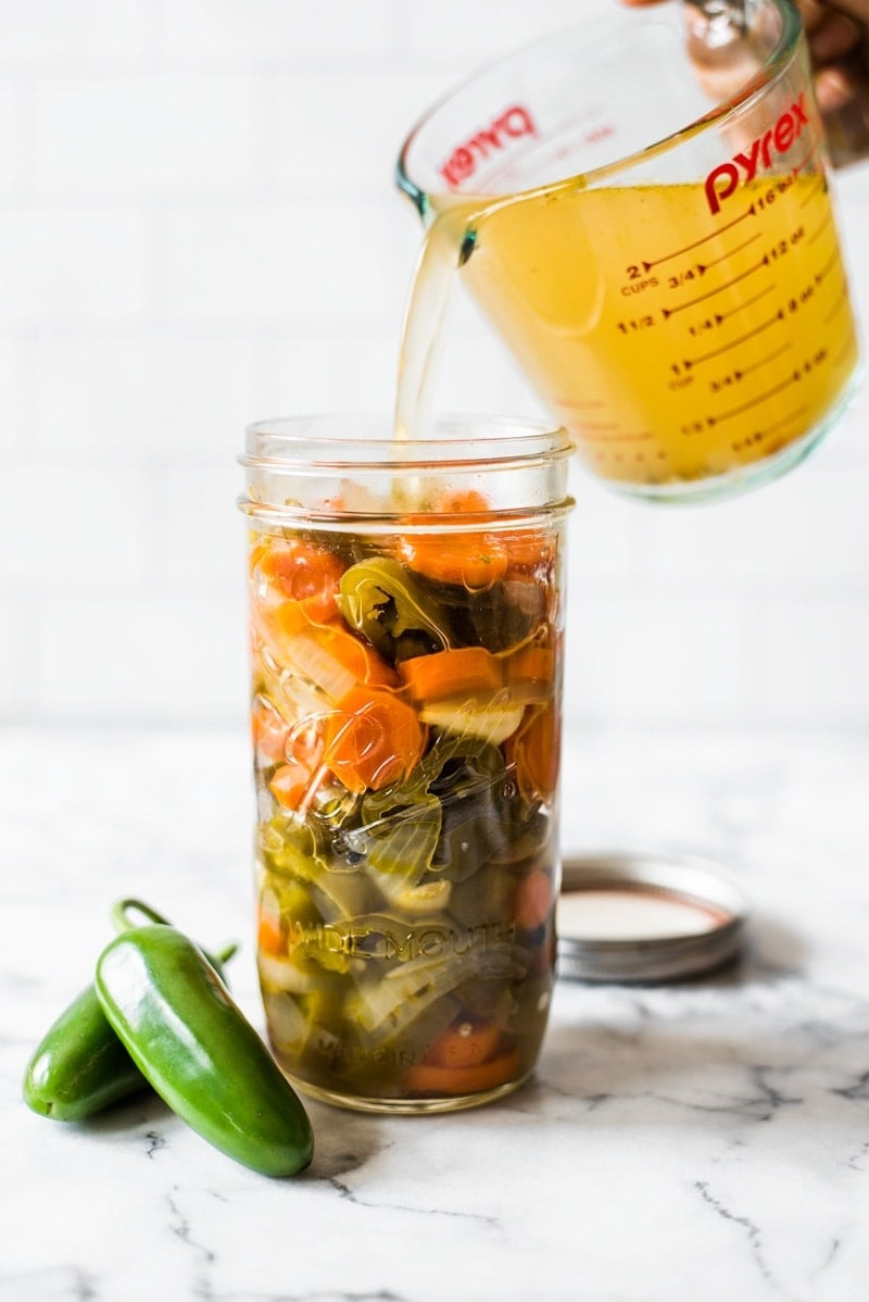 These Pickled Jalapenos are easy to make and are great for topping on all your favorite Mexican foods like nachos, tacos and enchiladas!