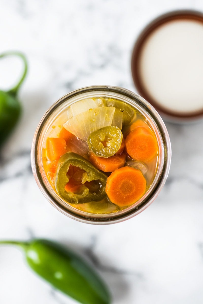 These Pickled Jalapenos are easy to make and are great for topping on all your favorite Mexican foods like nachos, tacos and enchiladas!