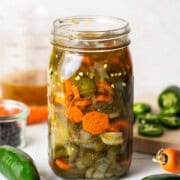 Pickled jalapenos in a jar ready to eat.