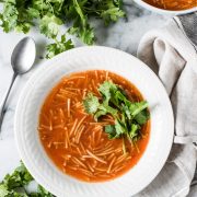 Sopa de Fideo, also known as Mexican noodle soup, is a tomato-based soup that's easy to make and perfect for the whole family! This satisfying and comforting soup is also vegetarian and vegan.