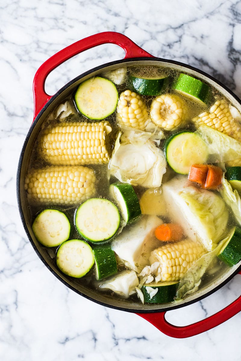 Caldo de Res, or Mexican beef soup, is a healthy and comforting soup made with a flavorful beef broth and squash, corn, carrots, cabbage and potatoes. 