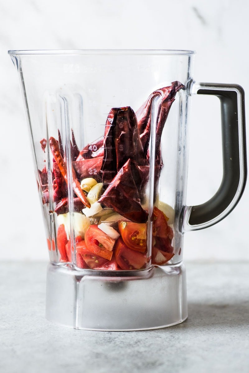 Guajillo peppers and chile de arbol in a blender for Camarones a la Diabla.