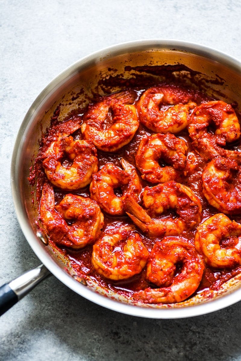 Camarones a la Diabla are juicy, large shrimp covered in a bright red chile pepper sauce that are ready to eat in 30 minutes! (gluten free, low carb, paleo) | Also known as diablo shrimp or spicy deviled shrimp.