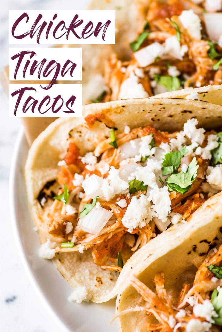 These Easy Chicken Tinga Tacos feature shredded chicken in a smoky chipotle sauce that's ready in only 30 minutes! (gluten free, low carb, paleo) #tacos #chickentacos #mexican #glutenfree
