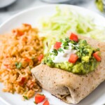These Easy Chicken Chimichangas are filled with shredded chicken and cheese, rolled in a whole wheat flour tortilla and baked to crispy crunchy perfection.