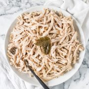 An Easy Shredded Chicken recipe that makes juicy, flavorful and tender chicken every time on the stove top. Use it in omelets, salads, tacos, nachos, soups, rice bowls, burritos, enchiladas and more!
