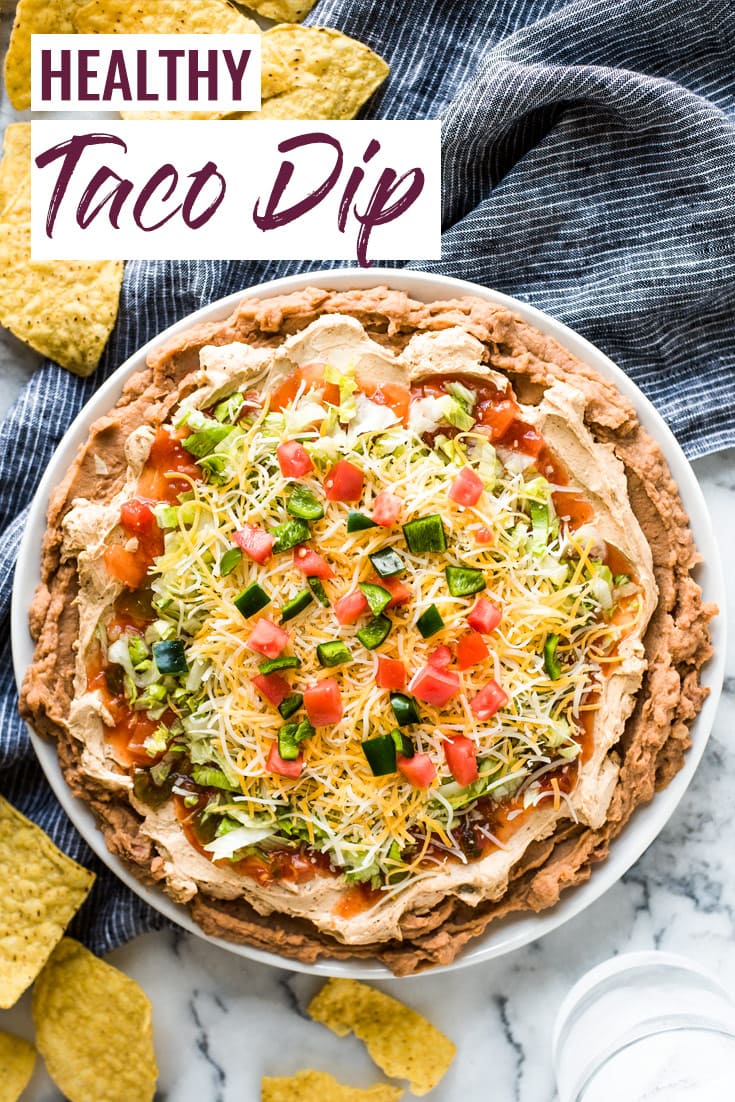 This Healthy Taco Dip made with 5 layers of delicious ingredients is ready in under 10 minutes and is the perfect appetizer for any party! (gluten free, vegetarian) #tacodip #mexican #healthy #appetizer