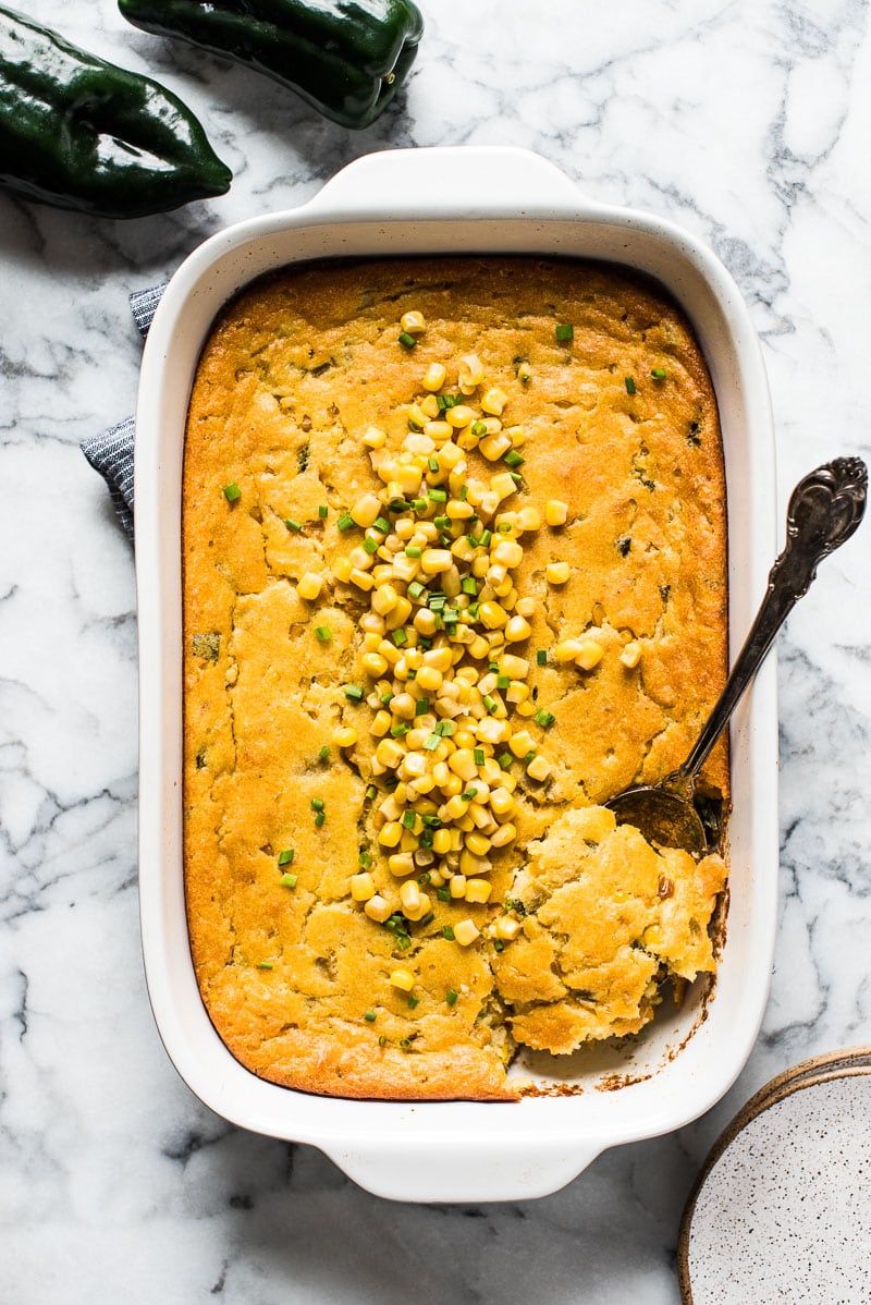 This Green Chile Corn Casserole is made with whole kernel corn, creamed corn and a box of corn muffin mix. It's one of the easiest recipes you'll make this holiday season!