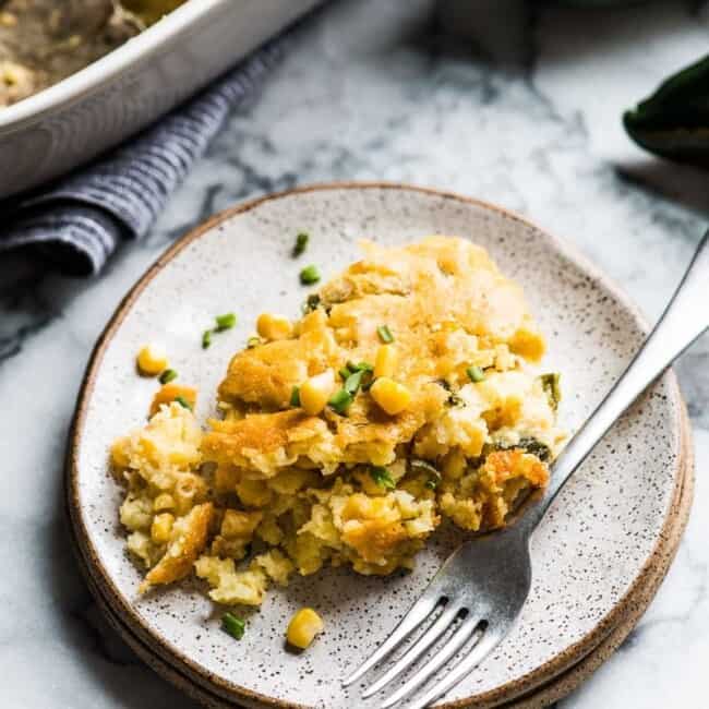 This Green Chile Corn Casserole is made with whole kernel corn, creamed corn and a box of corn muffin mix. It's one of the easiest recipes you'll make this holiday season!