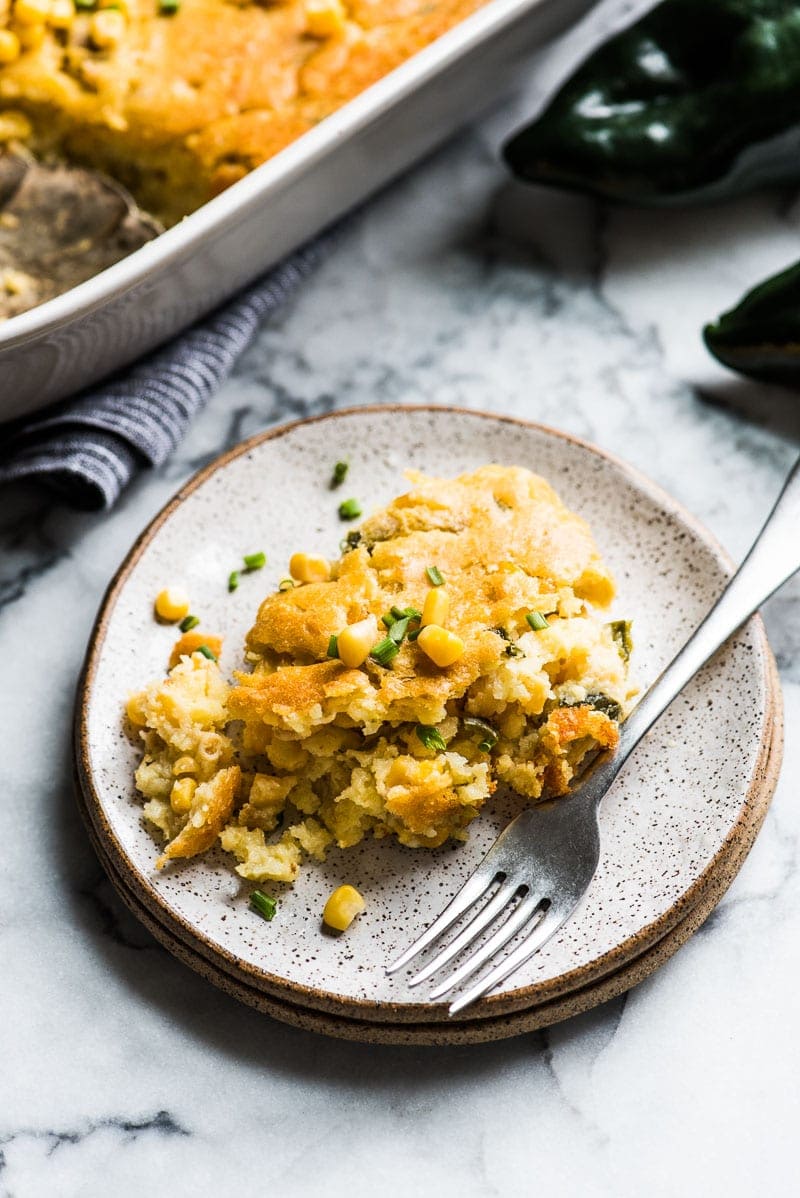 This Green Chile Corn Casserole is made with whole kernel corn, creamed corn and a box of corn muffin mix. It's one of the easiest recipes you'll make this holiday season!