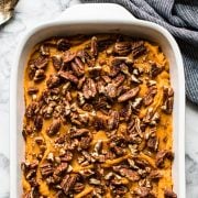 This easy and healthy Sweet Potato Casserole is made with sweet potatoes, butternut squash and candied pecans for a delicious holiday dish! (gluten free, vegetarian, paleo)