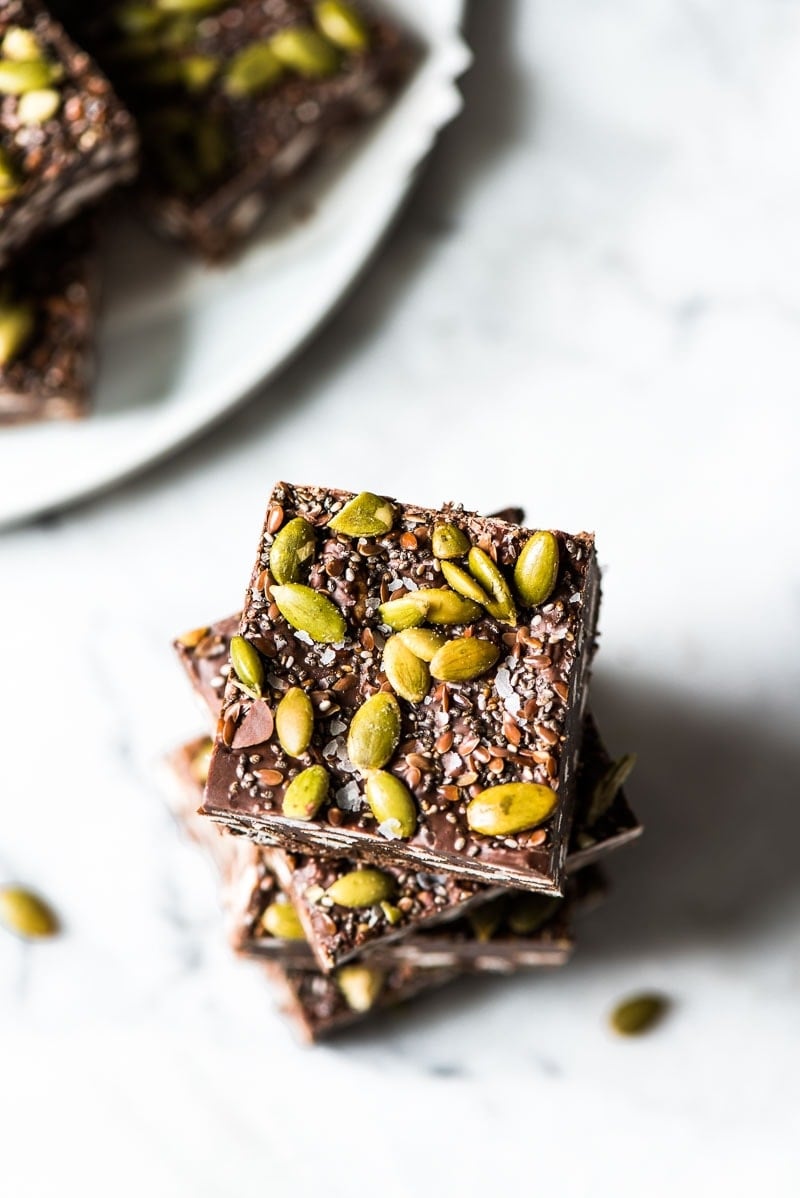 Chocolaty, crunchy and easy to make, these No Bake Chocolate Crunch Bars are made with puffed rice cereal, chocolate chips and good-for-you ingredients like pepitas for a delicious treat!
