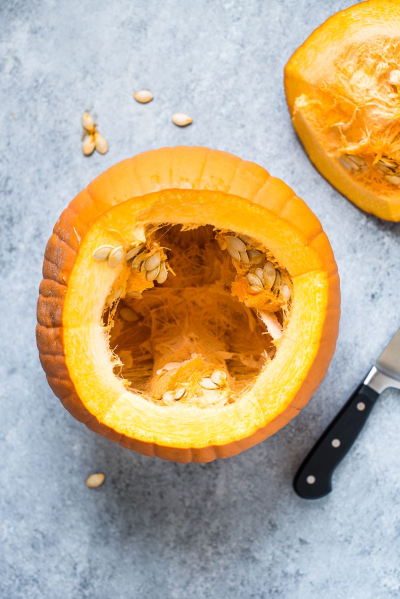 Pumpkin seeds inside a fresh pumpkin