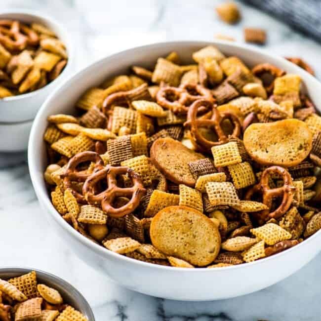 This Chex Mix recipe is easy to make and brings together all the crunchy, salty and delicious buttery flavors with a hint of smoky spicy goodness! It's the perfect snack for sharing!