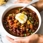 This Spicy Vegetarian Chili is thick, satisfying and super filling! Serve it with your favorite toppings for an easy and healthy meatless meal. (gluten free, vegetarian, vegan)