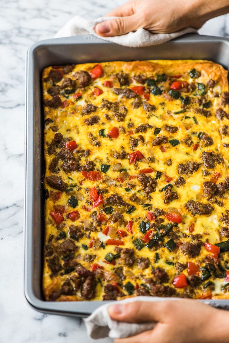 This Tex Mex Sausage Breakfast Casserole is made with crescent roll dough, breakfast sausage, peppers and onions. It's perfect for brunch and can be made ahead of time!