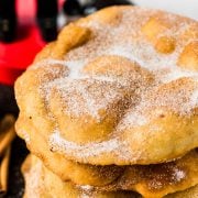 Often served during the Christmas and New Years holidays, this Mexican Bunuelos recipe makes the perfect fried dough covered in cinnamon sugar! #mexicanfoodrecipe #christmas