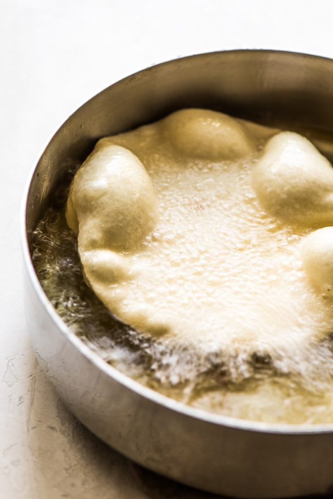 Often served during the Christmas and New Years holidays, this Mexican Bunuelos recipe makes the perfect fried dough covered in cinnamon sugar!