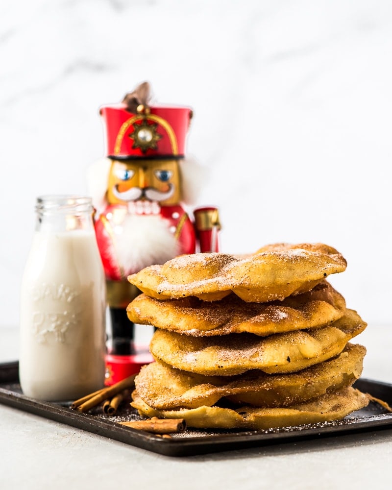 Often served during the Christmas and New Years holidays, this Mexican Bunuelos recipe makes the perfect fried dough covered in cinnamon sugar!