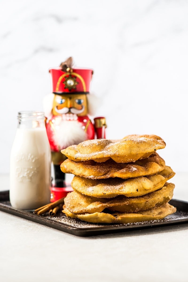 Often served during the Christmas and New Years holidays, this Mexican Bunuelos recipe makes the perfect fried dough covered in cinnamon sugar!