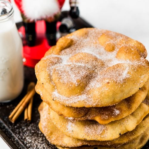 Often served during the Christmas and New Years holidays, this Mexican Bunuelos recipe makes the perfect fried dough covered in cinnamon sugar!