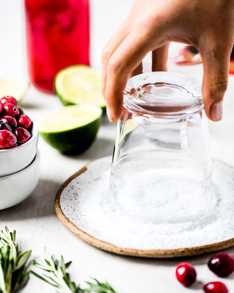 Filled with holiday cheer, this Cranberry Margarita is the perfect Christmas and New Years drink! Made with only 4 simple ingredients, it’s easy to make and comes together in only 5 minutes.