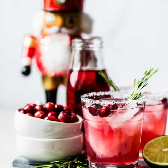 Filled with holiday cheer, this Cranberry Margarita is the perfect Christmas and New Years drink! Made with only 4 simple ingredients, it’s easy to make and comes together in only 5 minutes.