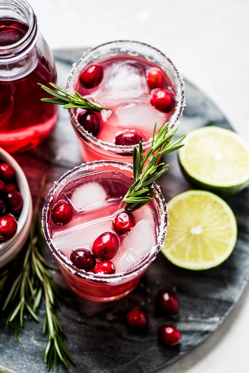 Filled with holiday cheer, this Cranberry Margarita is the perfect Christmas drink! Made with only 4 simple ingredients, it’s easy to make and comes together in only 5 minutes.