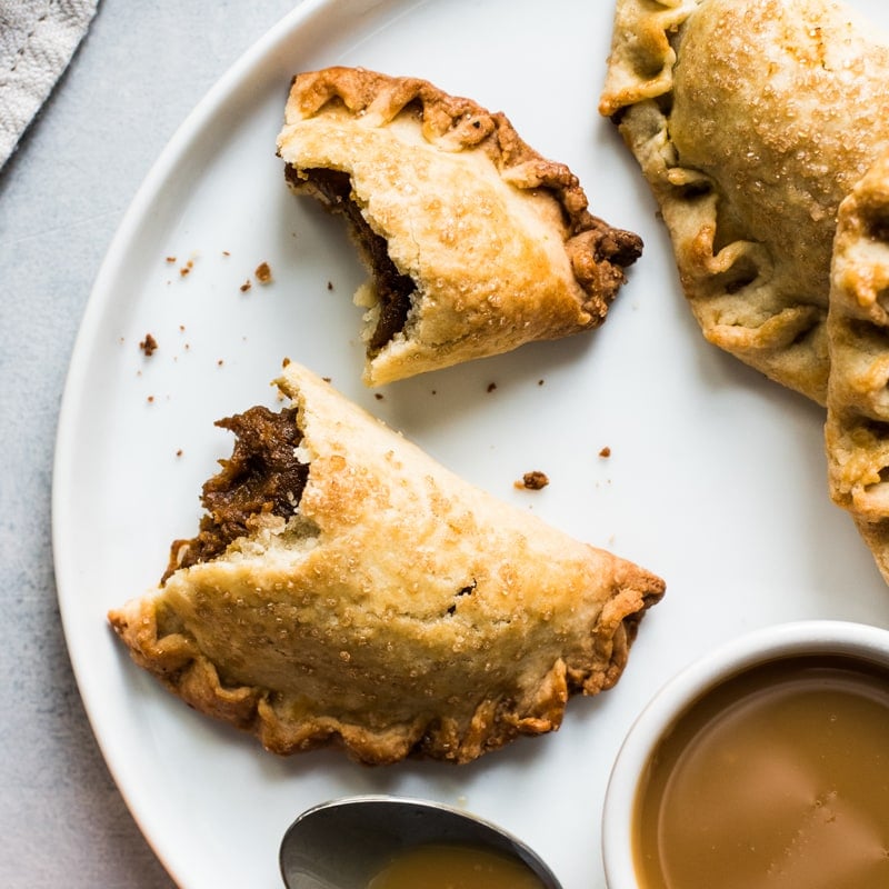 Easy Pumpkin Empanadas - Looking to spice up your holiday menu? These 12 Mexican Christmas food recipes are perfect for celebrating Las Posadas, Noche Buena and Navidad!