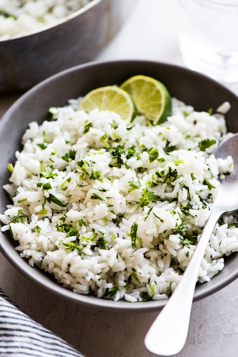 Cilantro Lime Rice in a bowl with a spoon.