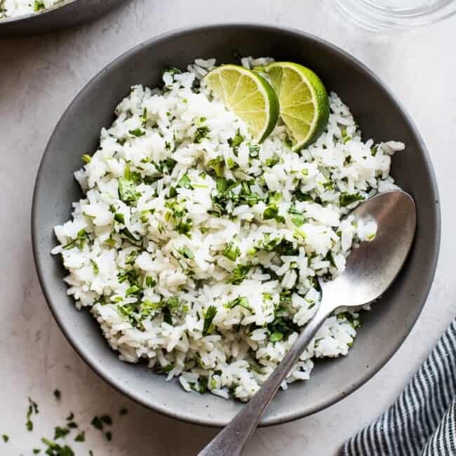 Overhead photo of Cilantro Lime Rice in a bowl with a spoon