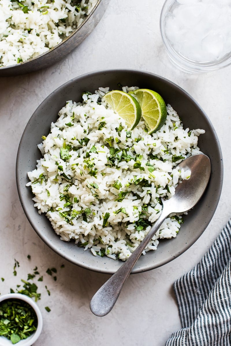 Overhead photo of Cilantro Lime Rice in a bowl with a spoon