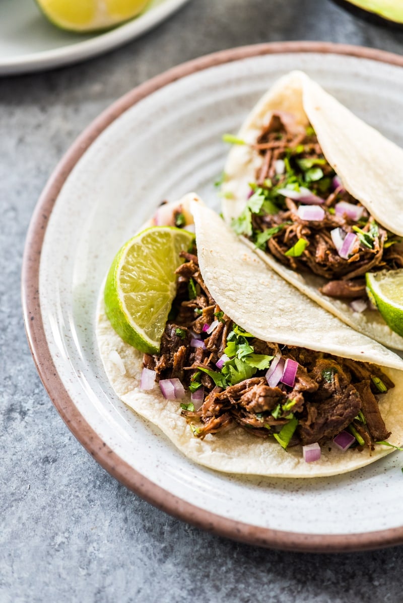 This moist and tender Mexican Shredded Beef is made in the Instant Pot in less than 2 hours! Its delicious by itself or great in tacos, salads and more.