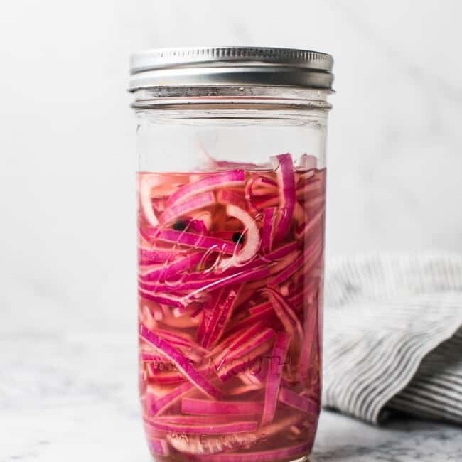 These pickled onions are quick and easy to prepare. They're ready to serve in 30 minutes and are the perfect condiment to just about any meal!