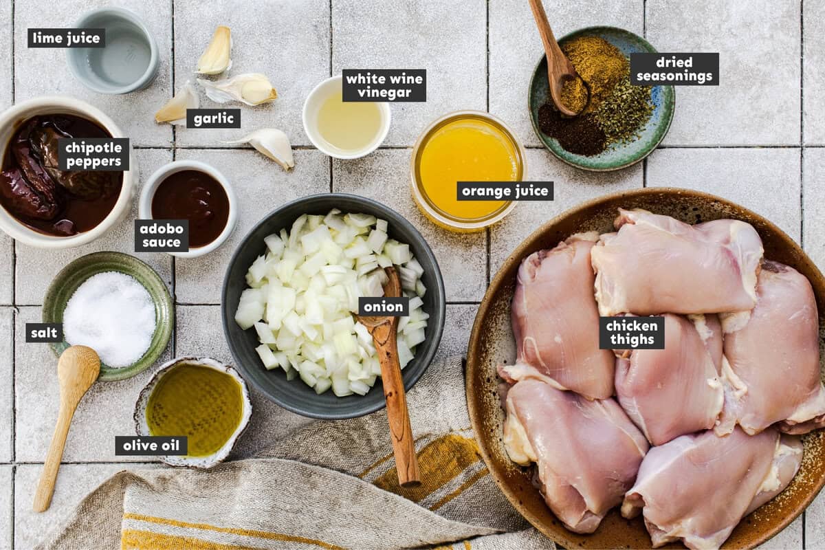 Ingredients for copycat Chipotle chicken marinade laid out on a counter.