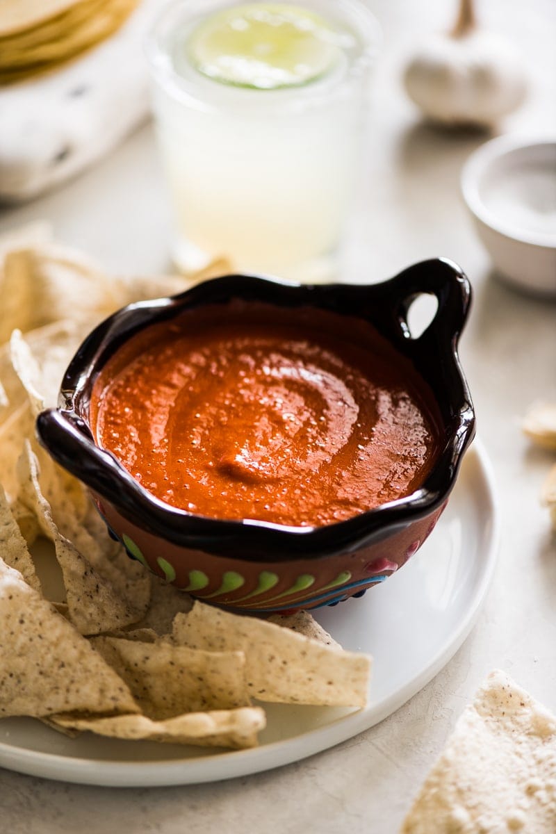 Chile de arbol salsa in a Mexican-style brown ornate small salsa bowl. 