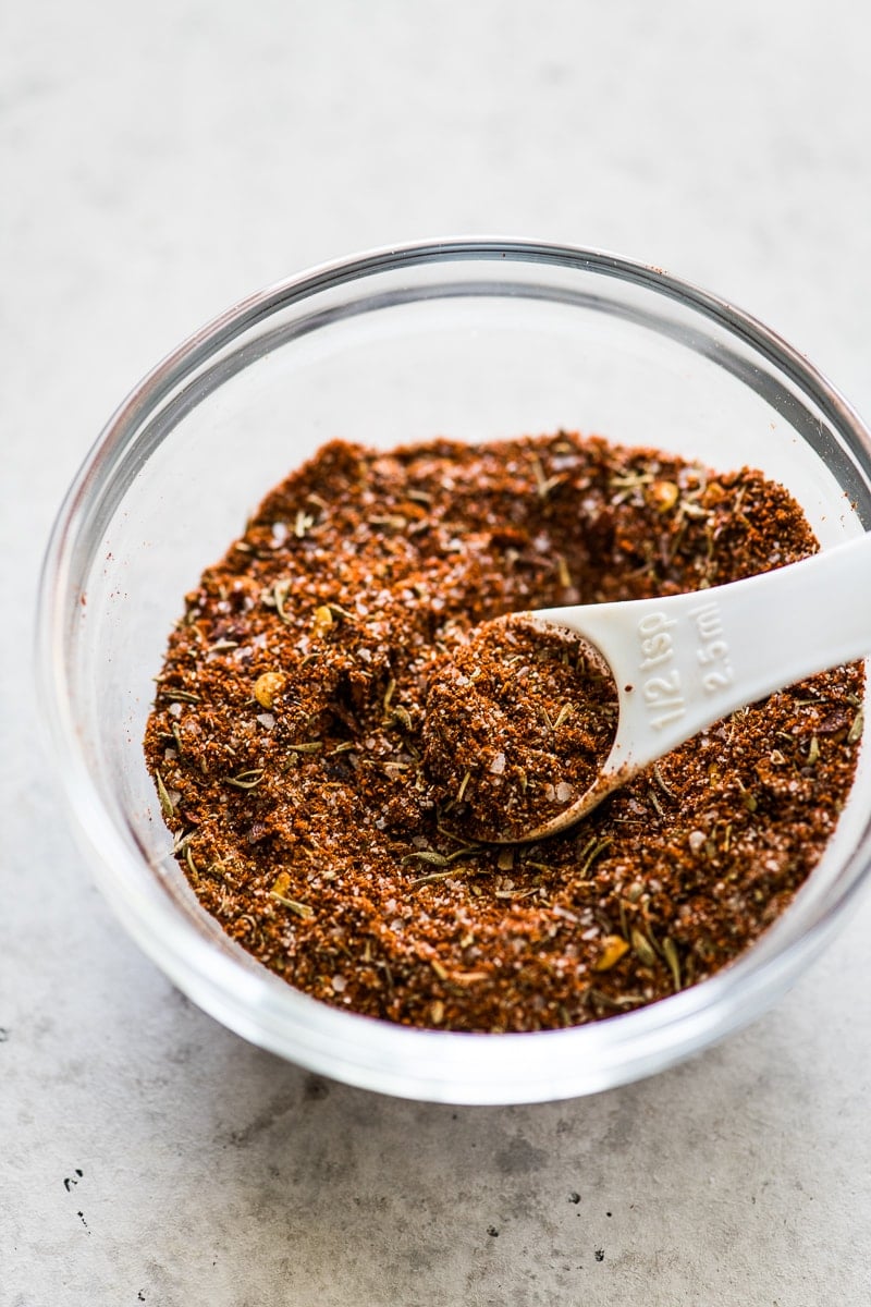 Dry rub for baked pork tenderloin in a small bowl.