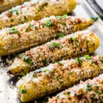 Mexican street corn on a large sheet pan