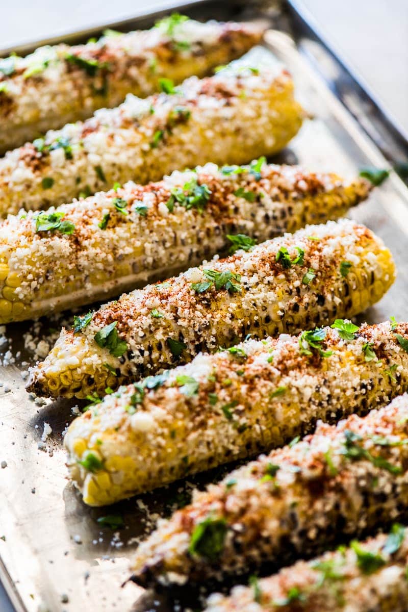 Mexican street corn on a large sheet pan