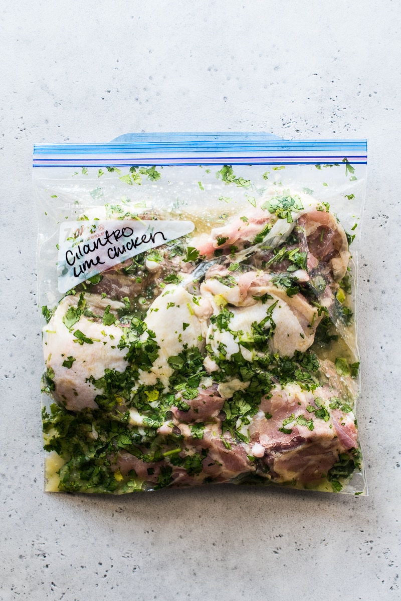 Cilantro Lime Chicken marinating in a large ziploc bag.