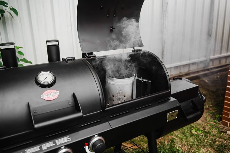 Char Griller Texas Trio Grill with a chimney starter used to start a charcoal grill.