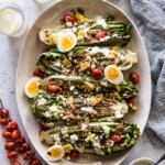 Grilled Romaine Salad on a large platter with jalapeno ranch dressing.