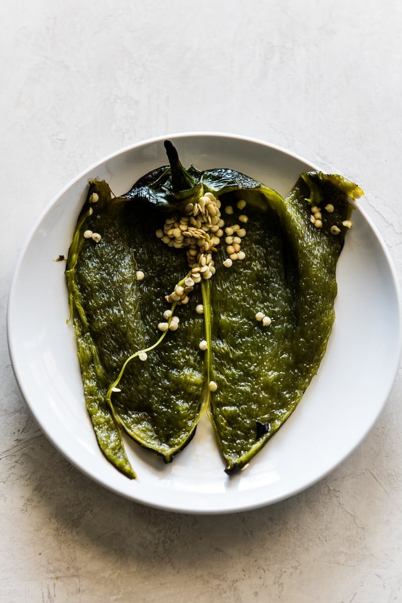 A roasted poblano pepper sliced open