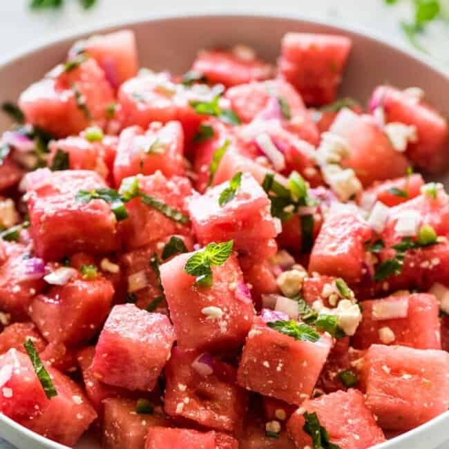 Easy Watermelon Salad topped with mint and crumbled feta cheese