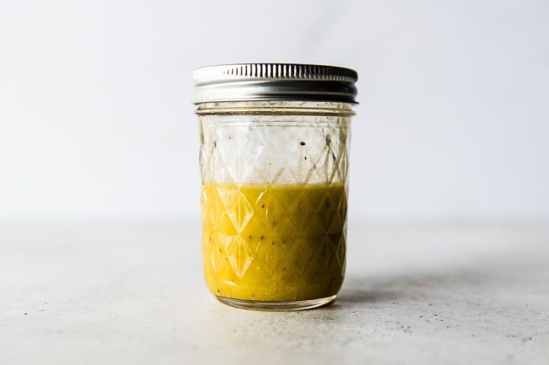 Salad dressing in a jar for brussels sprouts salad