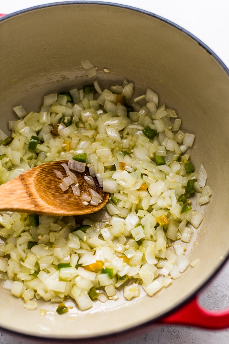 Sauteed onions and garlic for chicken enchilada soup.