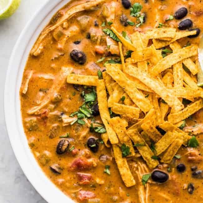 Chicken enchilada soup made with shredded chicken and black beans.