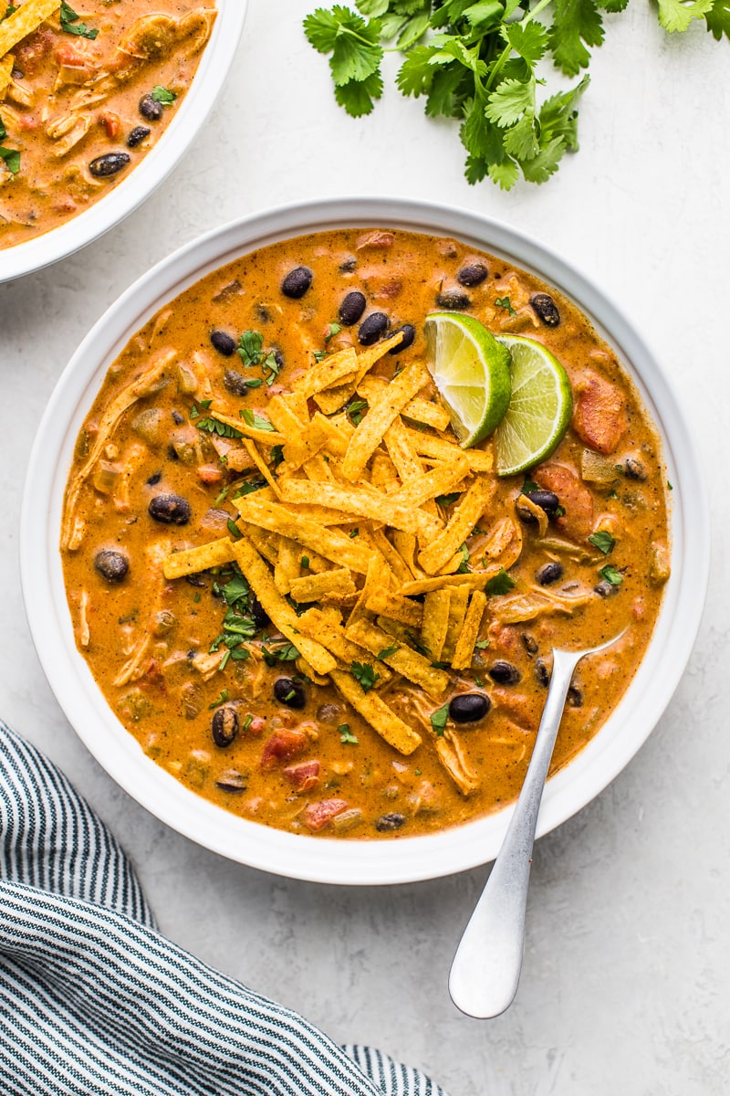 Chicken Enchilada Soup topped with tortilla strips